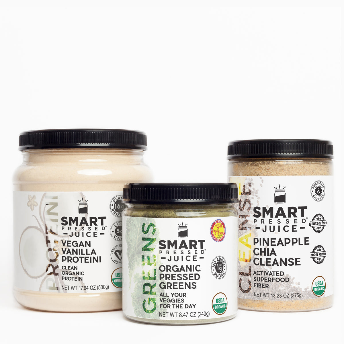 1 jar of 500 grams Vegan Vanilla Proteini and 1 jar of 240 grams Organic Pressed Greens and 1 jar of 375 grams Pineapple Chia Cleanse side by side against a white background.